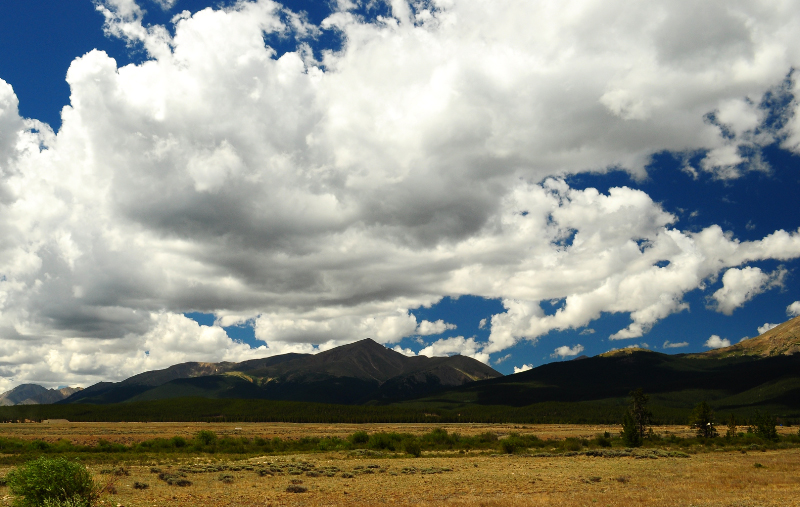 Cumulus clouds over Mt. Elbert signal a developing thunderstorm.