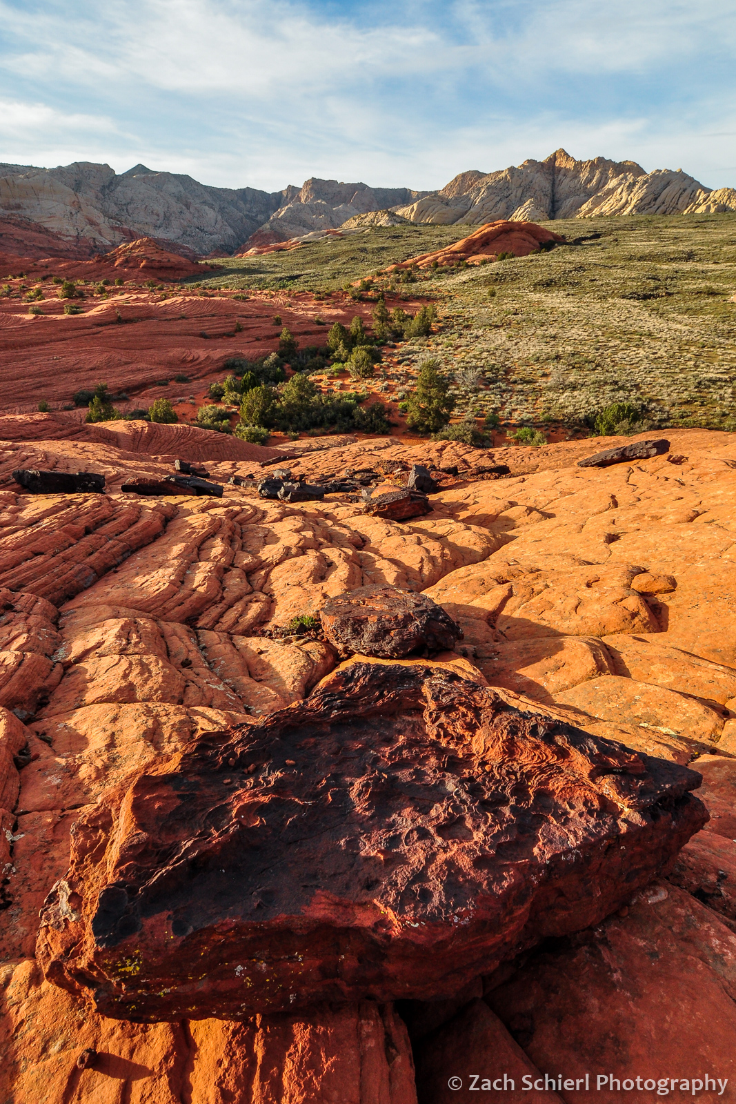 black boulders of hematite rich beds in the navajo sandstone, snow canyon state park, utah
