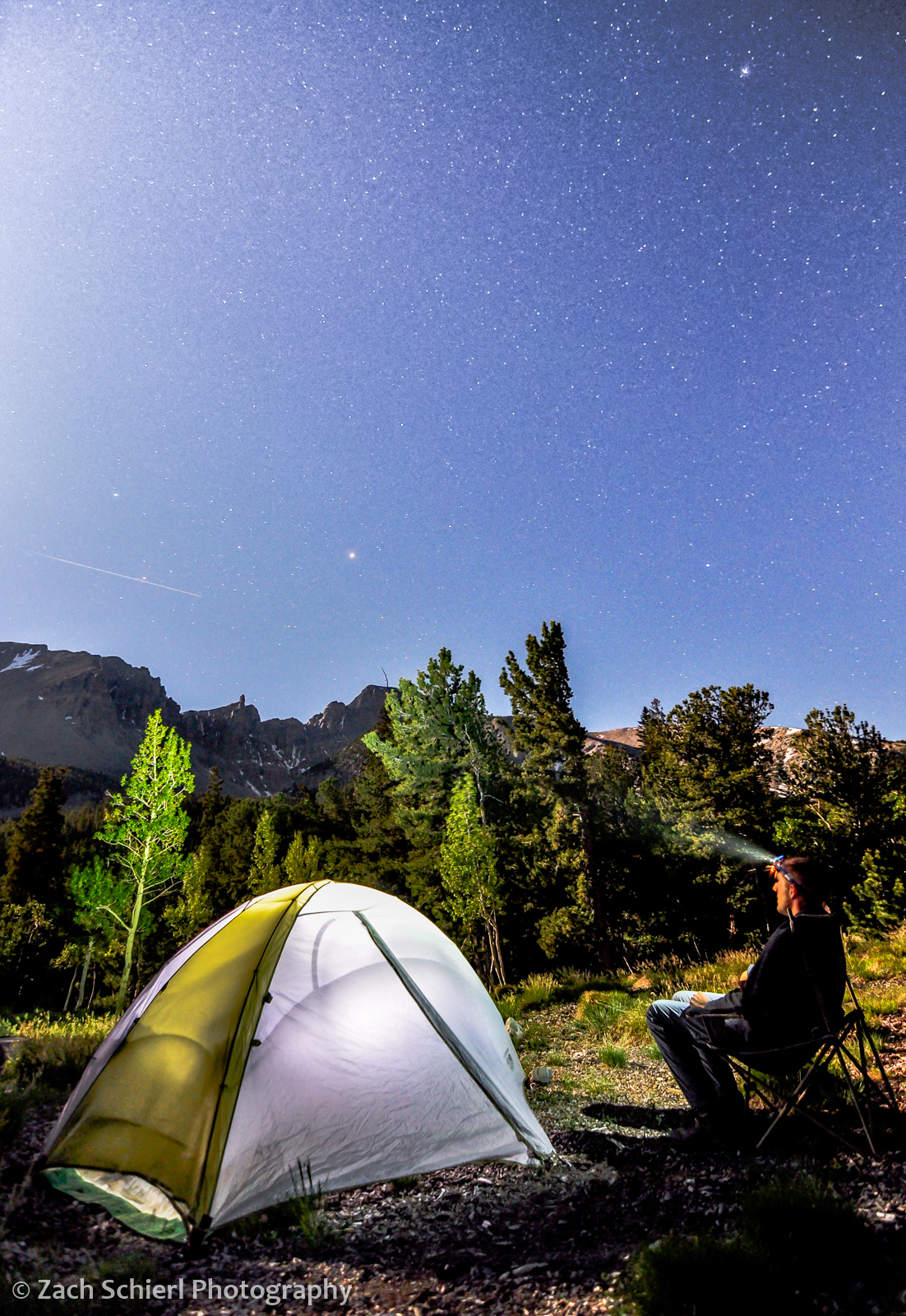 light from the full moon illuminates Wheeler Peak in Great Basin National Park