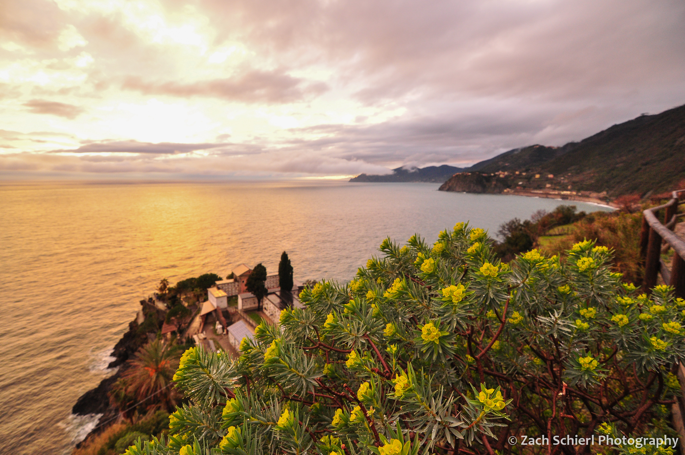 Colorful clouds and sea at sunset in Manarola.